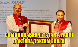 CUMHURBAŞKANI TATAR’A AFYONKARAHİSAR’DA FAHRİ DOKTORA TAKDİM EDİLDİ