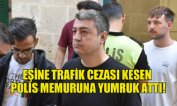 EŞİNE TRAFİK CEZASI KESEN  POLİS MEMURUNA YUMRUK ATTI!