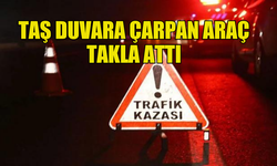 DİPKARPAZ'DA TAŞ DUVARA ÇARPAN ARAÇ TAKLA ATTI