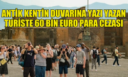 İTALYA'DA BİR ANTİK KENTİN DUVARINA YAZI YAZAN TURİSTE 60 BİN EURO CEZA