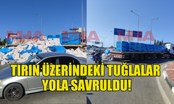 GİRNE ÇEVRE YOLU'NDA TIRIN ÜZERİNDEKİ TUĞLALAR YOLA SAVRULDU