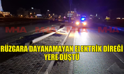 İSKELE LONG BEACH ÇEMBERİNDE RÜZGARA DAYANAMAYAN ELEKTRİK DİREĞİ YERE DÜŞTÜ.