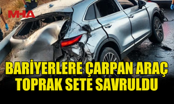 VİRAJI ALAMAYAN ARAÇ BARİYERLERE ÇARPTI: 2 YARALI