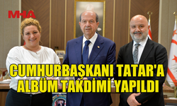 CUMHURBAŞKANI ERSİN TATAR'A ALBÜM TAKDİMİ YAPILDI