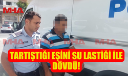 TARTIŞTIĞI EŞİNİ SU LASTİĞİ İLE DARP ETTİ!