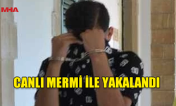 ERCAN HAVALİMANI’NDA BAGAJINDA 9 MM TABANCA MERMİSİ İLE YAKALANDI