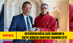 ERTUĞRULOĞLU AZİZ SANCAR’A KKTC KİMLİK KARTINI TAKDİM ETTİ