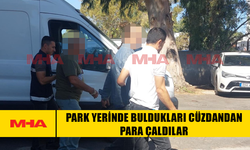 PARK YERİNDE BULDUKLARI CÜZDANDAN PARA ÇALDILAR
