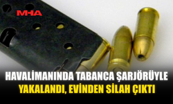 HAVALİMANINDA TABANCA ŞARJÖRÜYLE YAKALANDI