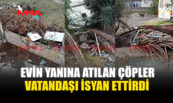 EVİN YANINA ATILAN ÇÖPLER VATANDAŞI İSYAN ETTİRDİ