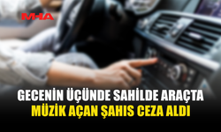 SAHİLDE ARAÇTA MÜZİK DİNLEDİ CEZA ALDI