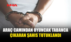 OYUNCAK TABANCAYI CAMDAN ÇIKARDI, TUTUKLANDI