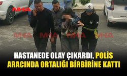 POLİS ARACINDA ORTALIĞI BİRBİRİNE KATTI