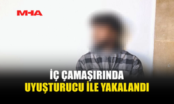 İÇ ÇAMAŞIRINDA YASAKLI MADDE İLE YAKALANDI