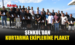 ŞENKUL, DENİZ FACİASINDA KURTARMA ÇALIŞMALARINA DESTEK VERENLERE PLAKET TAKDİM ETTİ