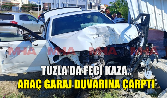 TUZLA'DA BİR SÜRÜCÜ EVİN BAHÇE KAPISI VE GARAJ DUVARINA ÇARPTI