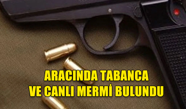 GİRNE'DE TRAFİK KONTROLÜ MAKSADIYLA DURDURULAN ARAÇTA TABANCA VE CANLI MERMİ BULUNDU