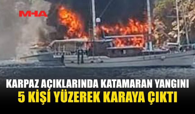 DİPKARPAZ’DA KATAMARANDA YANGIN: YAT TAMAMEN YANDI