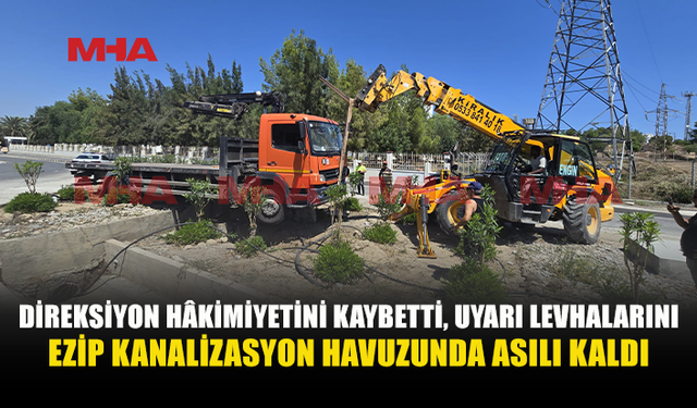 KAMYONET KANALİZASYON HAVUZUNUN ÜZERİNDE ASILI KALDI
