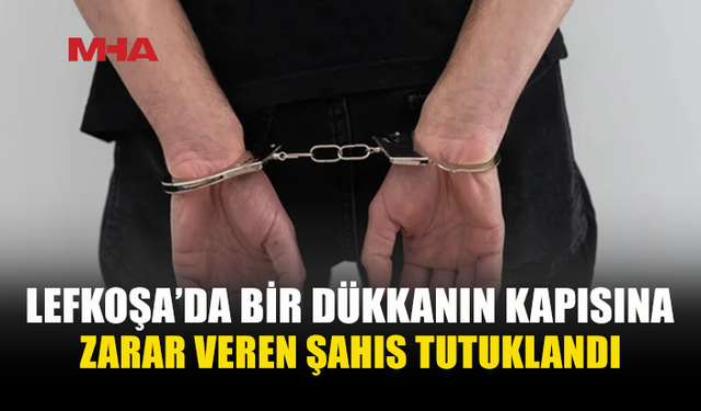DÜKKÂNIN GİRİŞ KAPISINA ZARAR VERDİ, TUTUKLANDI