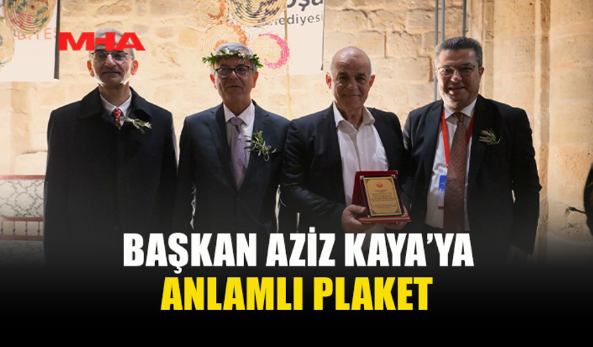 BAŞKAN AZİZ KAYA’YA TEŞEKKÜR VE PLAKET