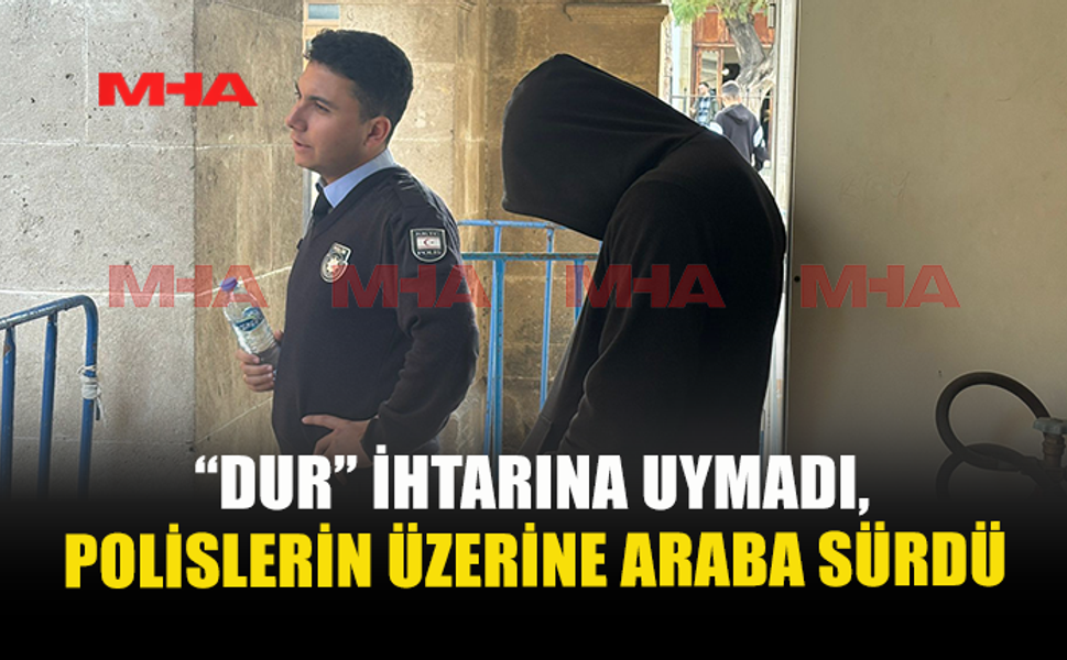 “DUR” İHTARINA UYMADI,POLİSLERİN ÜZERİNE ARABA SÜRDÜ