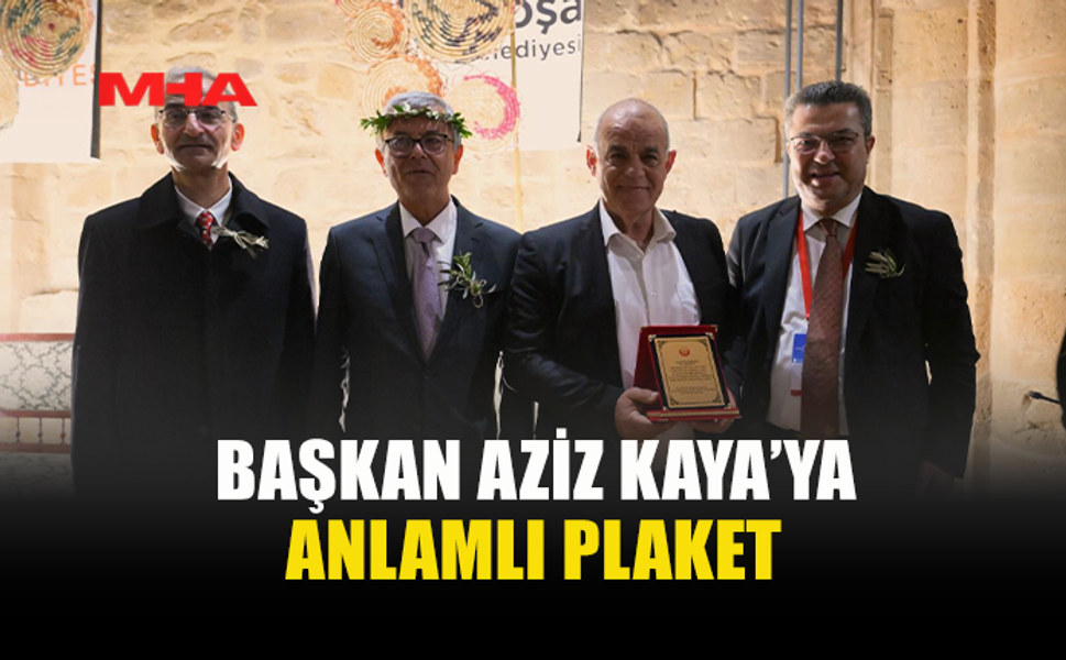 BAŞKAN AZİZ KAYA’YA TEŞEKKÜR VE PLAKET