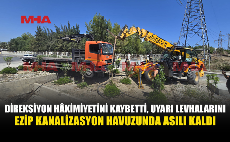 KAMYONET KANALİZASYON HAVUZUNUN ÜZERİNDE ASILI KALDI