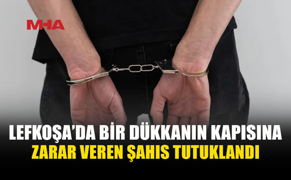 DÜKKÂNIN GİRİŞ KAPISINA ZARAR VERDİ, TUTUKLANDI